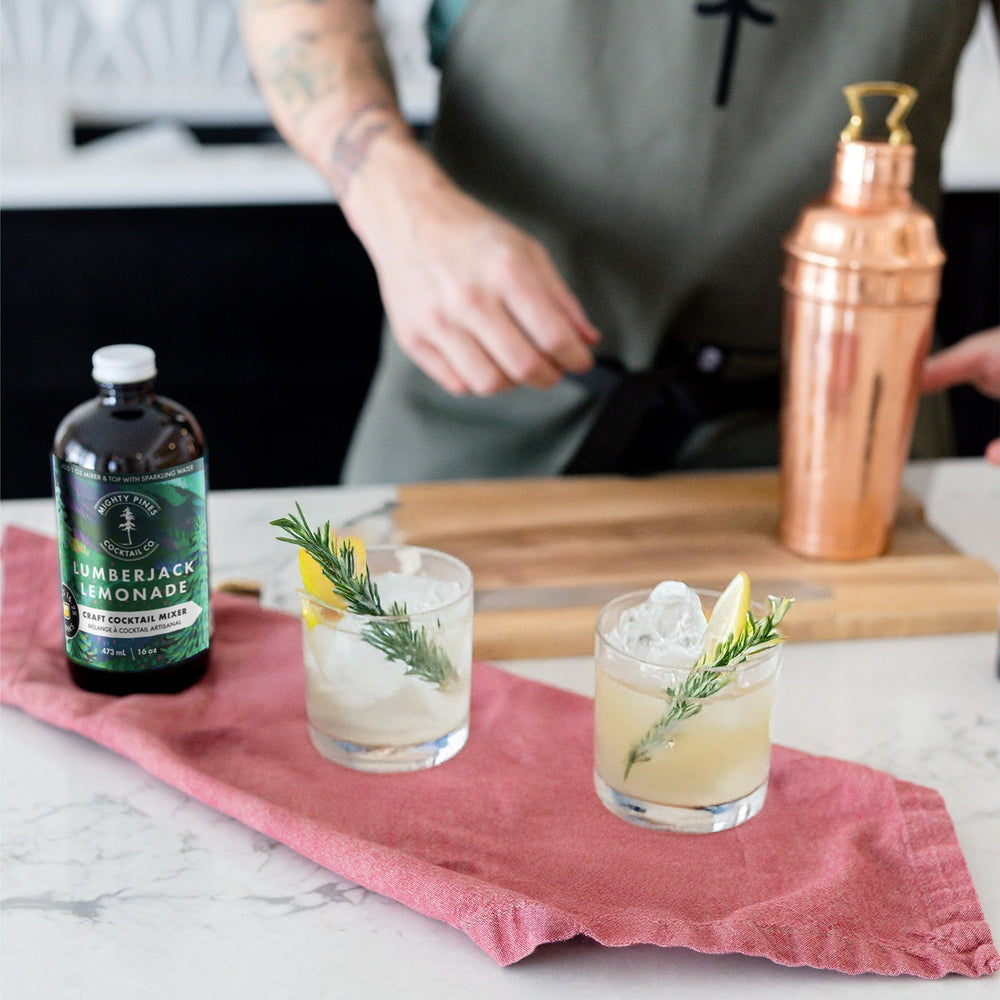 Lumberjack Lemonade cocktail or mocktail with spruce tips and lemon. 